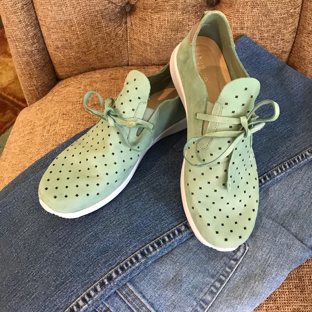 Nurture shoes.  Omg….. love these but I now wear a 7 1/2.